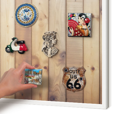 Magnetic board for travel magnets in a white frame Wooden boards