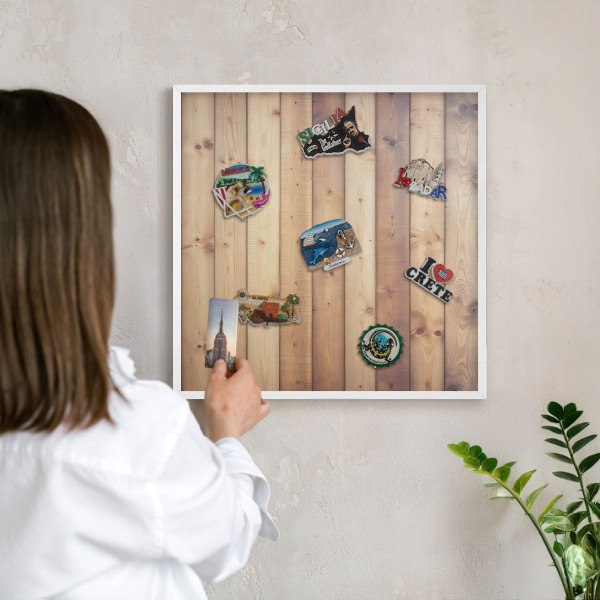 Magnetic board for travel magnets in a white frame Wooden boards