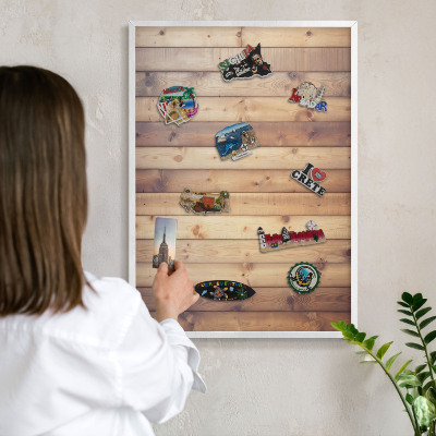 Magnetic board for travel magnets in a white frame Wooden boards