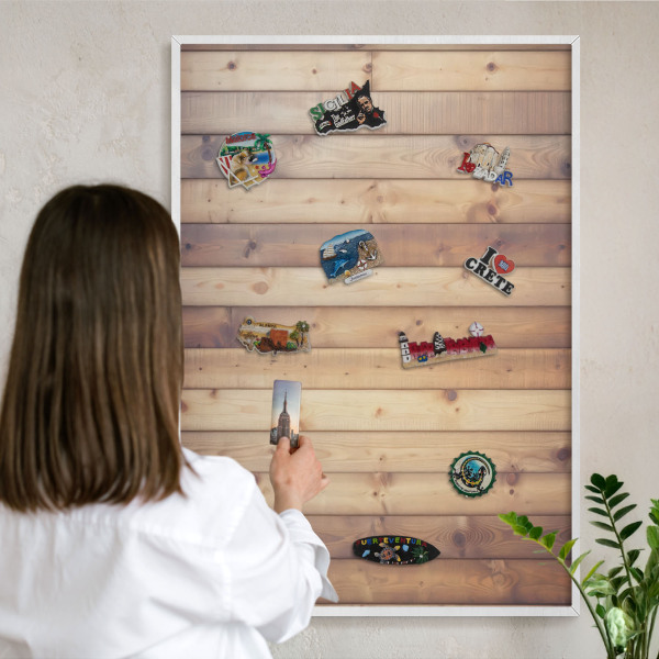 Magnetic board for travel magnets in a white frame Wooden boards