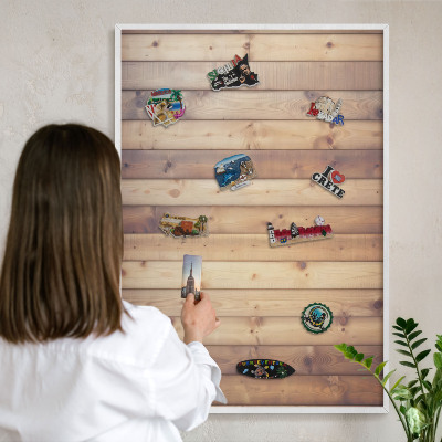 Magnetic board for travel magnets in a white frame Wooden boards