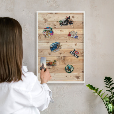 Decorative magnet board with a white frame Wooden boards