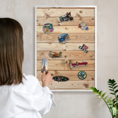 Decorative magnet board with a white frame Wooden boards