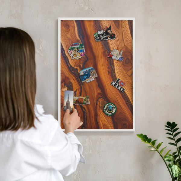 Magnetic board for travel magnets in a white frame Wooden rings
