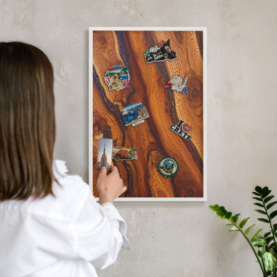 Magnetic board for travel magnets in a white frame Wooden rings