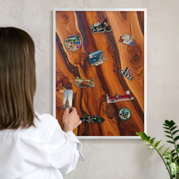 Magnetic board for travel magnets in a white frame Wooden rings