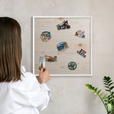 Magnetic board for travel magnets in a white frame Wooden pattern