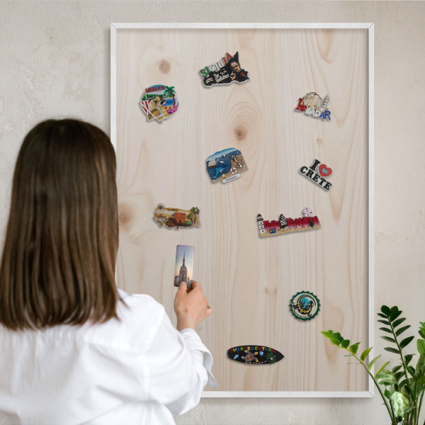Magnetic board for travel magnets in a white frame Wooden pattern