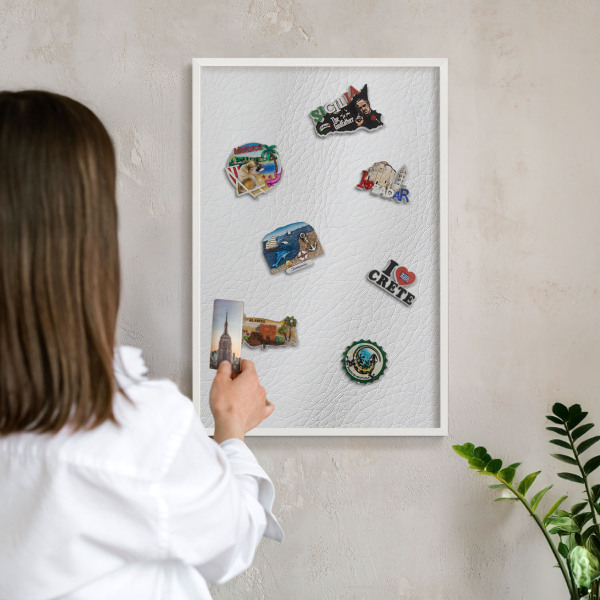 Magnetic board for travel magnets in a white frame Elegant texture