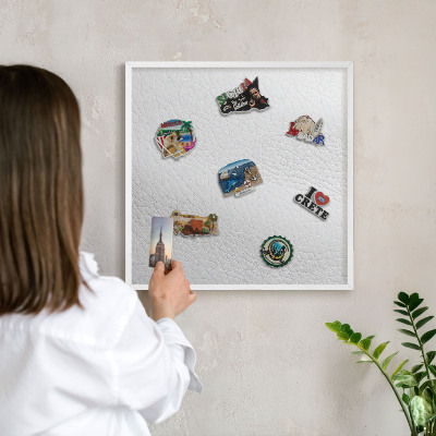 Magnetic board for travel magnets in a white frame Elegant texture