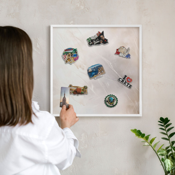 Magnetic board for travel magnets in a white frame Soft lightness