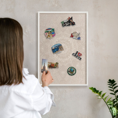 Decorative magnet board with a white frame Decorative mandala