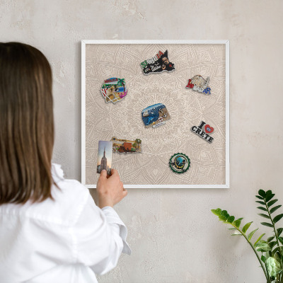 Decorative magnet board with a white frame Decorative mandala