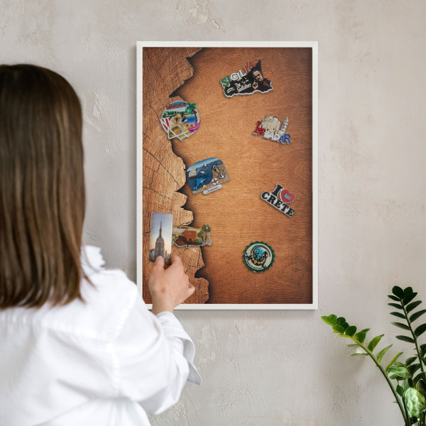 Magnetic board for travel magnets in a white frame Wooden texture