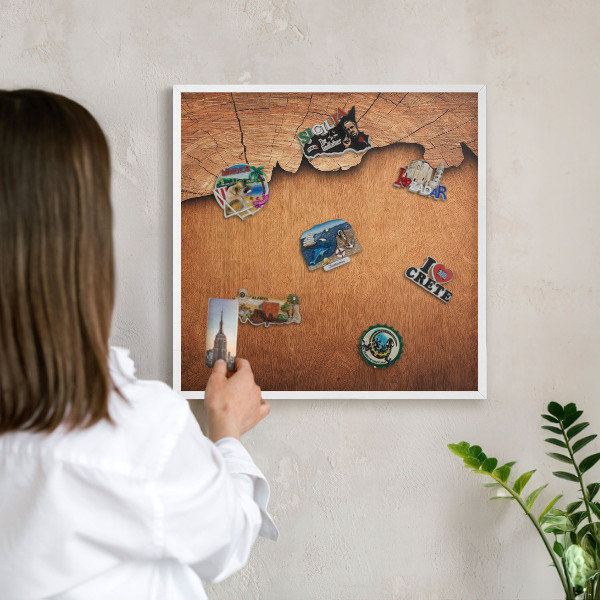 Magnetic board for travel magnets in a white frame Wooden texture