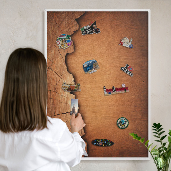 Magnetic board for travel magnets in a white frame Wooden texture