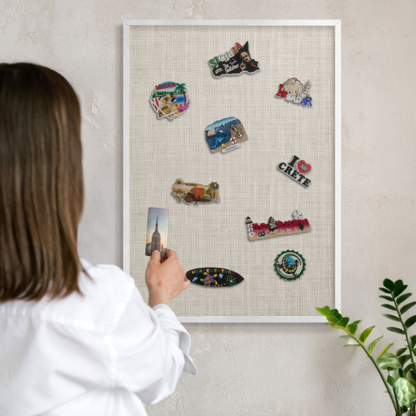 Decorative magnet board with a white frame Subtle elegance