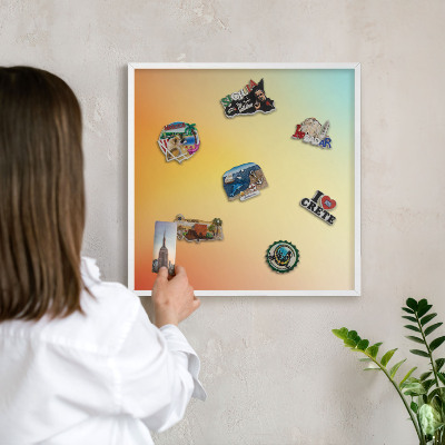 Magnetic board for travel magnets in a white frame Color transition