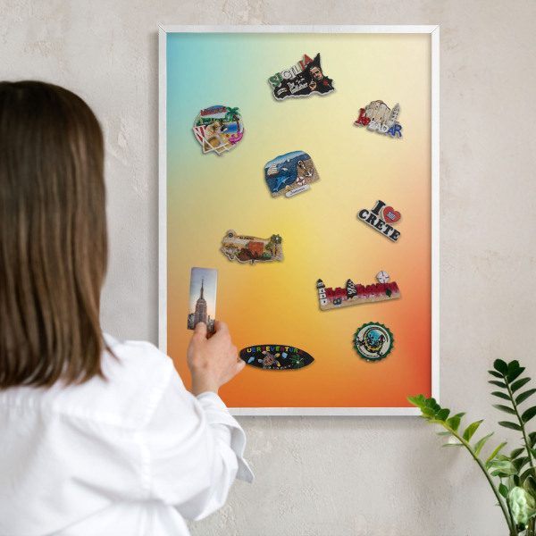 Magnetic board for travel magnets in a white frame Color transition