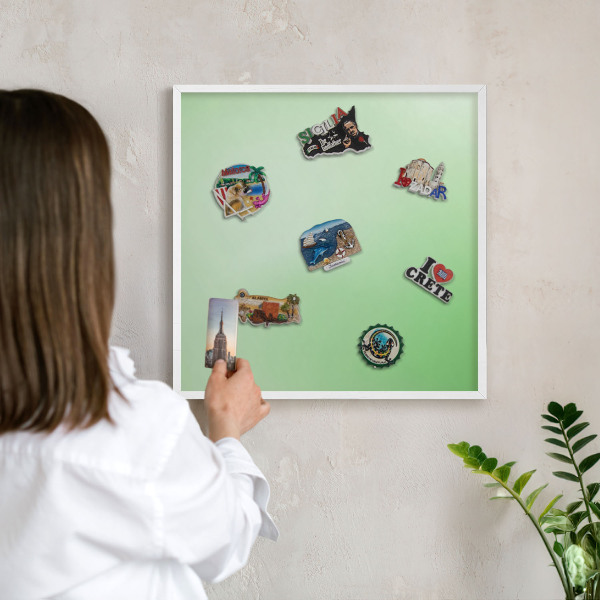 Magnetic board for travel magnets in a white frame Green harmony