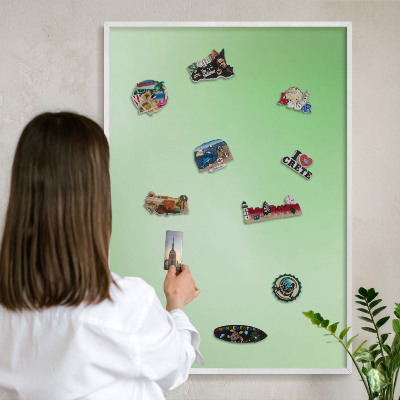 Magnetic board for travel magnets in a white frame Green harmony