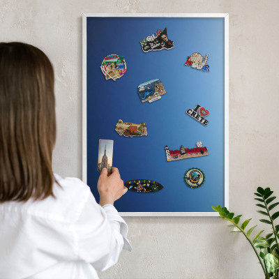 Magnetic board for travel magnets in a white frame Blue gradients