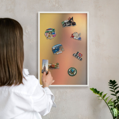 Magnetic board for travel magnets in a white frame Colorful glow