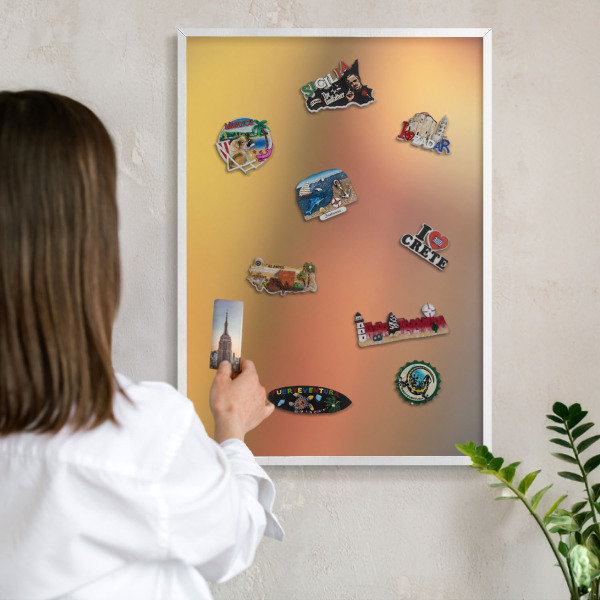 Magnetic board for travel magnets in a white frame Colorful glow