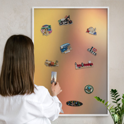 Magnetic board for travel magnets in a white frame Colorful glow