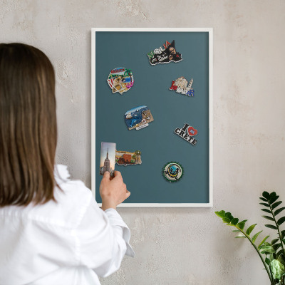 Decorative magnet board with a white frame Dark turquoise