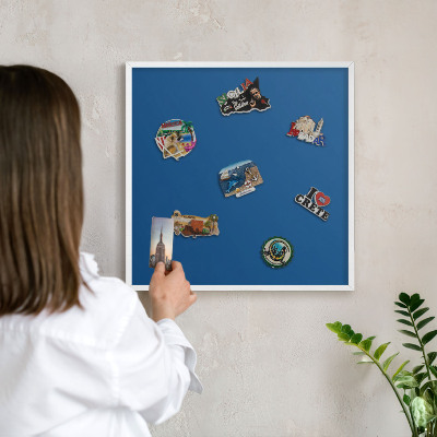 Magnetic board for travel magnets in a white frame Dark blue