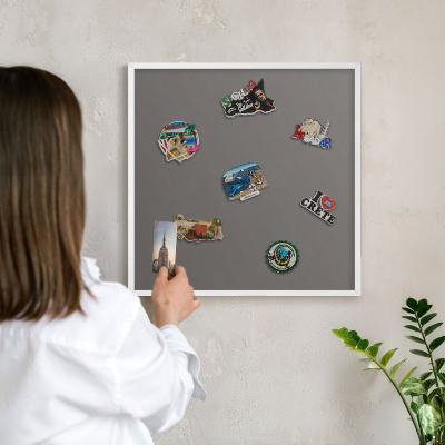 Magnetic board for travel magnets in a white frame Dark gray