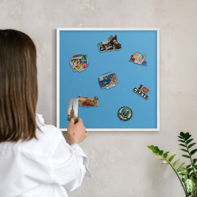 Decorative magnet board with a white frame Blue water