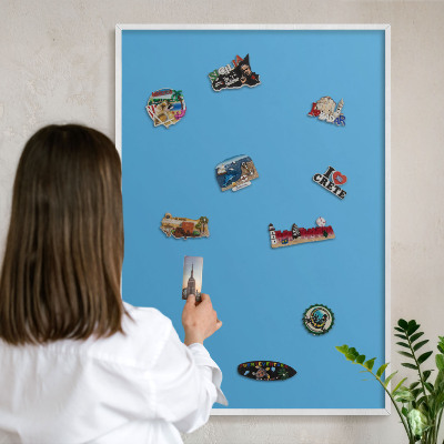 Decorative magnet board with a white frame Blue water