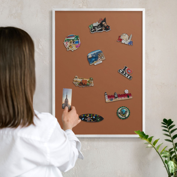 Magnetic board for travel magnets in a white frame Dark orange