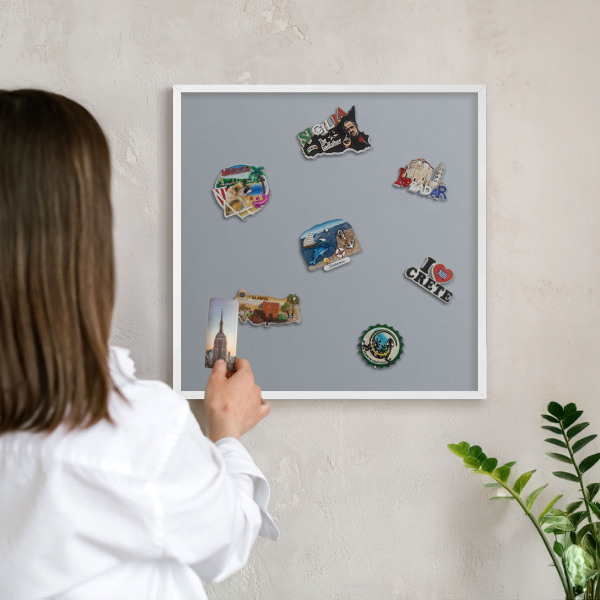 Decorative magnet board with a white frame Delicate gray