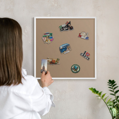 Magnetic board for travel magnets in a white frame Warm light brown