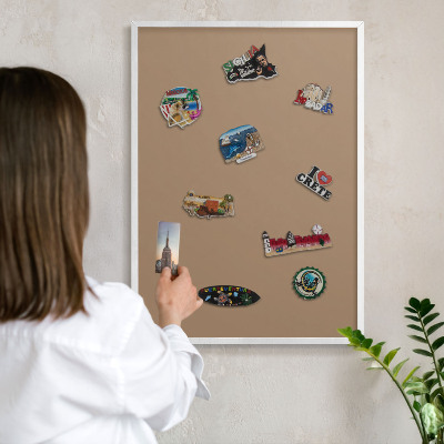 Magnetic board for travel magnets in a white frame Warm light brown