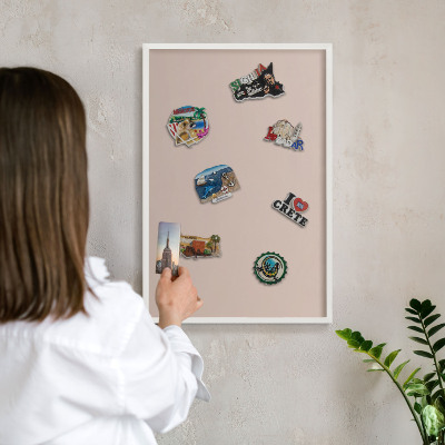 Decorative magnet board with a white frame Beige pink