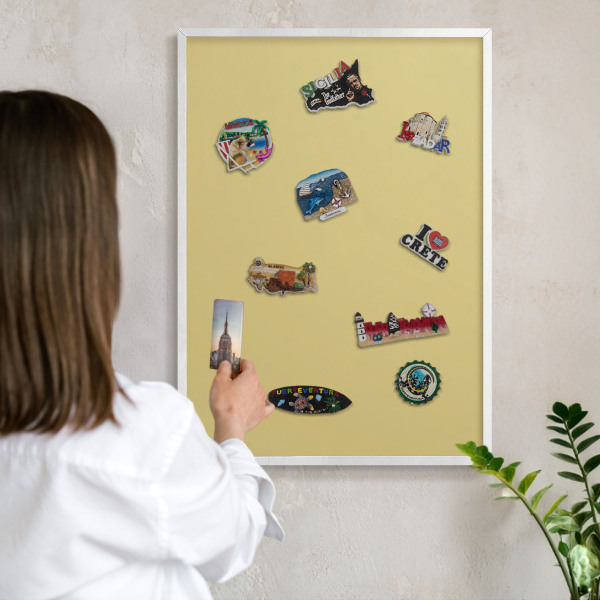 Magnetic board for travel magnets in a white frame Vintage yellow