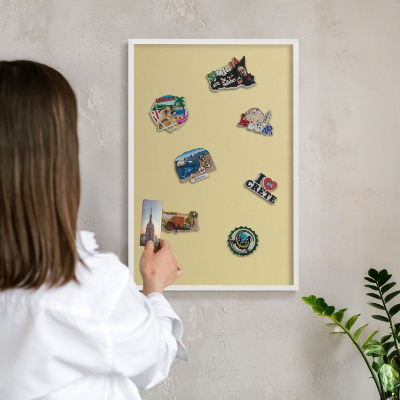 Magnetic board for travel magnets in a white frame Beige-yellow
