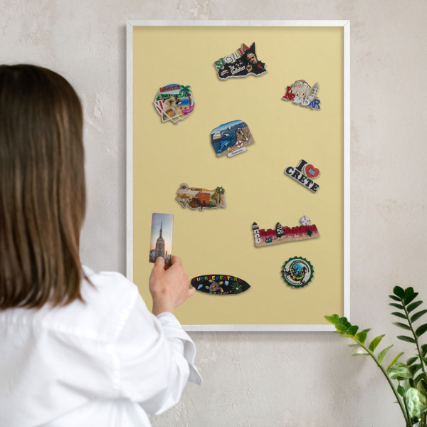 Magnetic board for travel magnets in a white frame Beige-yellow