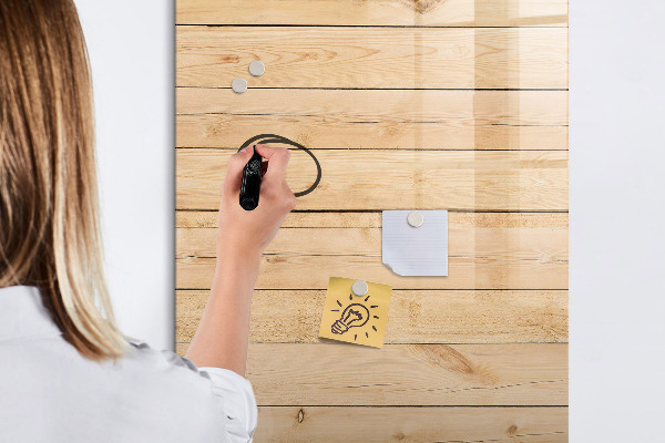 Magnetic dry erase board Note board on a wooden background