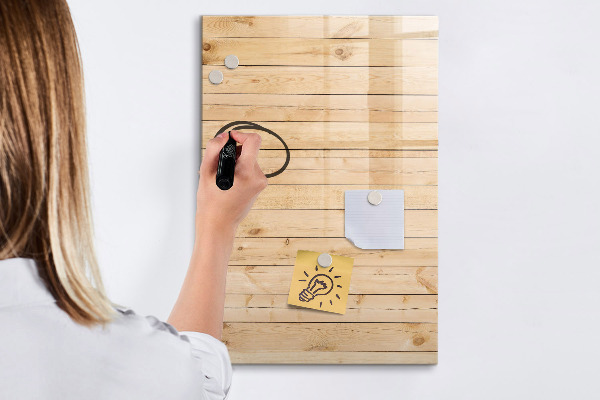 Magnetic dry erase board Note board on a wooden background