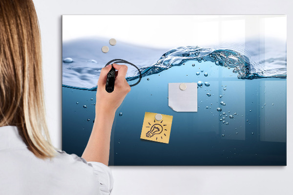 Magnetic dry erase board Water background with photos and accessories