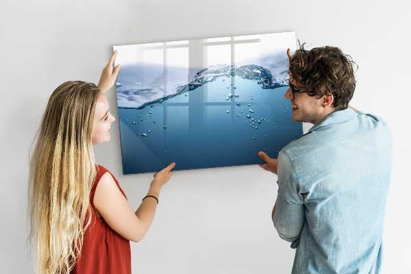 Magnetic dry erase board Water background with photos and accessories