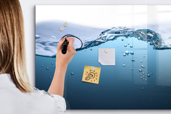 Magnetic dry erase board Water background with photos and accessories