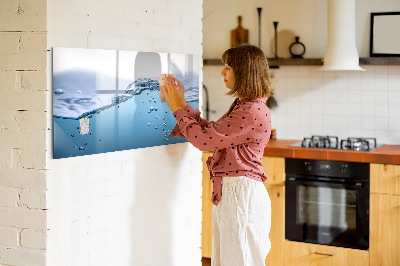 Magnetic dry erase board Water background with photos and accessories