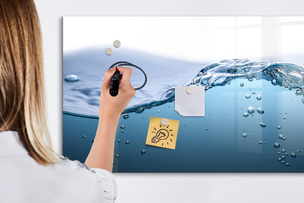 Magnetic dry erase board Water background with photos and accessories