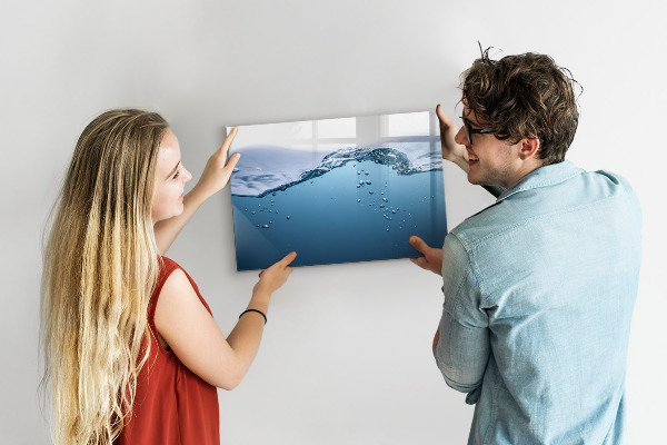 Magnetic dry erase board Water background with photos and accessories